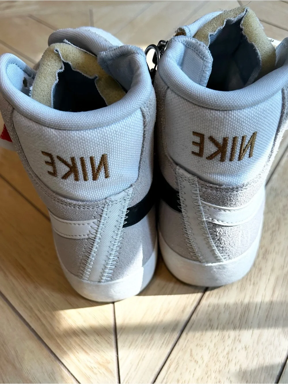 Nike Mid-Top Suede Sneakers in Light Gray with Black Swoosh and Tan Zipper